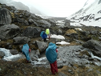 Walking in the rain to Baslaoa Thatch