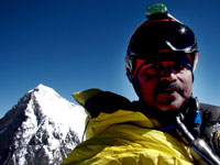 On the top of Mt. Lohtse with Mt. Everest in the background